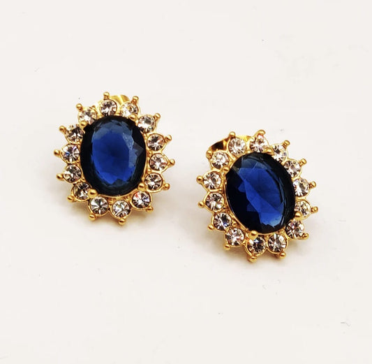 Oorbellen met grote blauw steen