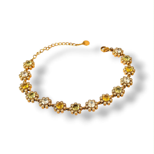 Armketting met geel groen steentjes